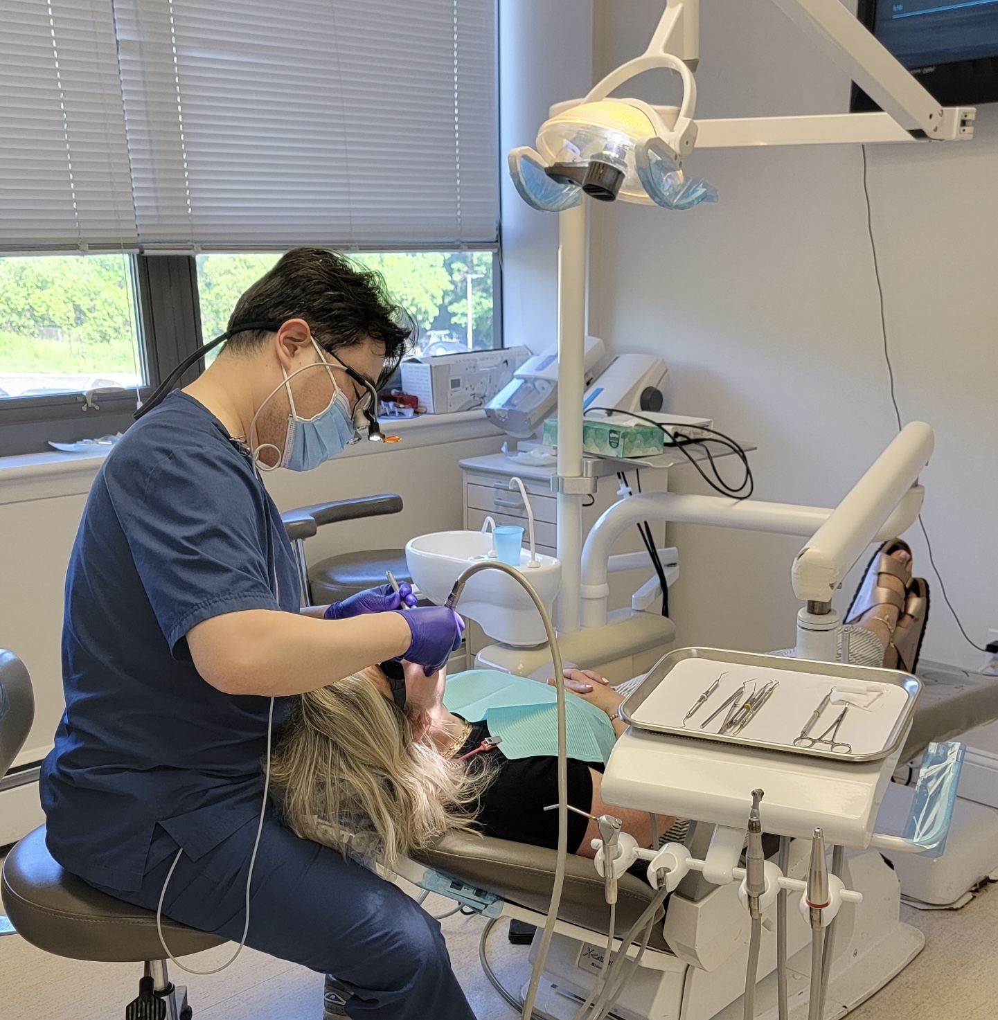 Dr. Oh treating a patient